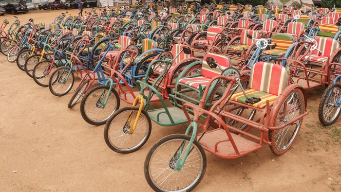 ABUJA, NIGERIA - MAY 11: Walking disabled people receive wheelchair bikes which are distributed within aid campaign organized under President-elect of Nigeria Bola Ahmed Tinubu in Abuja, Nigeria on May 11, 2023. (Photo by Emmanuel Osodi/Anadolu Agency via Getty Images)