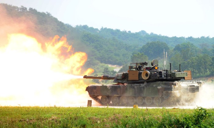 A US M1A2 SEP Abrams battle tank fires live rounds during a joint military exercise between South Korea and the US at the US Armys Rodriguez Live Firing Range in Pocheon, about 46 km northeast of Seoul and about 15 km south of the demilitarized zone separating the two Koreas, on September 1, 2011.  The Korean peninsula is the worlds last Cold War frontier as Stalinst North Korea and pro-Western South Korea have been technically at war since the 1950-53.  AFP PHOTO / PARK JI-HWAN (Photo credit should read PARK JI-HWAN/AFP via Getty Images)