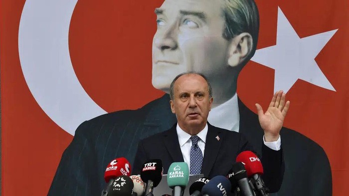 FILE - Muharrem Ince gestures as he announces his resignation from Turkeys main opposition party, CHP, during a media conference next to a poster of modern Turkeys founder, Mustafa Kemal Ataturk, in Ankara, Turkey, Monday, Feb. 8, 2021. Muharrem Ince, the leader of the center-left Homeland Party, a candidate in Sundays elections announced Thursday, May 11, 2023 that he is withdrawing from the presidential race, in a move that is likely to bolster President Recep Tayyip Erdogans main challenger. (AP Photo/File)