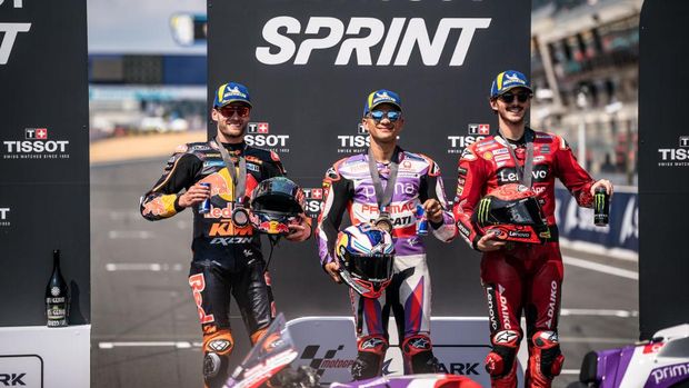 LE MANS, FRANCE - MAY 13: Riders after Sprint on the main straight - Brad Binder of South Africa and Red Bull KTM Factory Racing (2nd), Jorge Martin of Spain and Prima Pramac Racing (1st) and Francesco Bagnaia of Italy and Ducati Lenovo Team (3rd) during the Sprint of the MotoGP SHARK Grand Prix de France at Bugatti Circuit on May 13, 2023 in Le Mans, France. (Photo by Steve Wobser/Getty Images)
