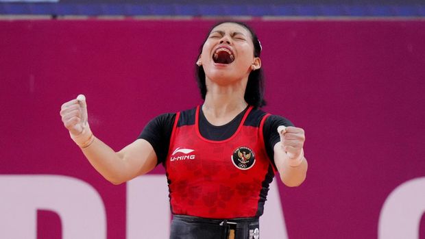 Southeast Asian Games - Weightlifting - Olympic Taekwondo Hall, Phnom Penh, Cambodia - May 15, 2023 Indonesia's Tsabitha Alfiah Ramadani reacts during the women's - 64kg REUTERS/Cindy Liu