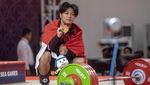 Mantap! Lifter Rahmat Erwin Raih Emas dan Pecah Rekor SEA Games
