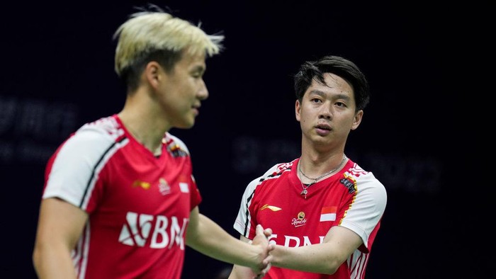 SUZHOU, CHINA - MAY 15: (CHINA OUT) Marcus Fernaldi Gideon (L) and Kevin Sanjaya Sukamuljo of Indonesia react in the Mens Doubles Round Robin match against Kevin Lee and Ty Alexander Lindeman of Canada during day two of the Sudirman Cup at Suzhou Olympic Sports Center Gymnasium on May 15, 2023 in Suzhou, China. (Photo by Shi Tang/Getty Images)