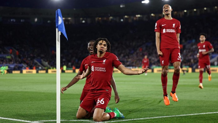 Liverpools English defender Trent Alexander-Arnold (C) celebrates after scoring his team third goal during the English Premier League football match between Leicester City and Liverpool at King Power Stadium in Leicester, central England on May 15, 2023. (Photo by DARREN STAPLES / AFP) / RESTRICTED TO EDITORIAL USE. No use with unauthorized audio, video, data, fixture lists, club/league logos or live services. Online in-match use limited to 120 images. An additional 40 images may be used in extra time. No video emulation. Social media in-match use limited to 120 images. An additional 40 images may be used in extra time. No use in betting publications, games or single club/league/player publications. /  (Photo by DARREN STAPLES/AFP via Getty Images)