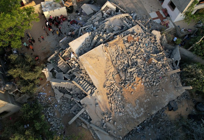 A view shows the remains of the residential building that housed the apartment of five disabled Palestinian siblings, who were ordered by Israeli army to leave their apartment before it was bombed by Israel in recent Israel-Gaza fighting, in the northern Gaza Strip, May 15, 2023. REUTERS/Mohammed Salem