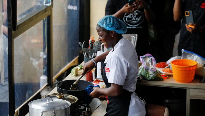 Nigerian Chef Hilda Bassey, 27, attempts to break the Guinness World Record for the longest cooking time by an individual, in Lagos, Nigeria May 15, 2023. REUTERS/Temilade Adelaja