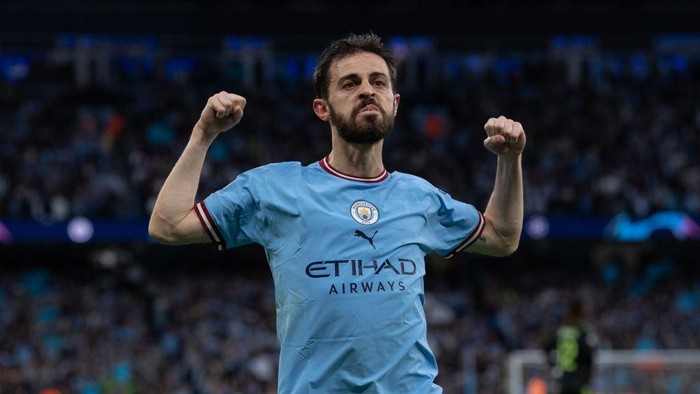 MANCHESTER, ENGLAND - MAY 17: Bernardo Silva of Manchester City celebrates scoring the second goal during the UEFA Champions League semi-final second leg match between Manchester City FC and Real Madrid at Etihad Stadium on May 17, 2023 in Manchester, United Kingdom. (Photo by Visionhaus/Getty Images)