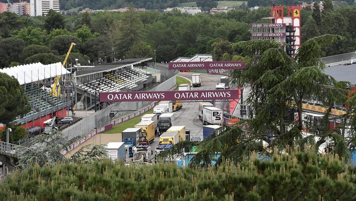 A helicopter flies above the closed Motor racing-Imola paddock, as Santerno river levels rise due to heavy rain, ahead of the weekend's cancelled Emilia Romagna Grand Prix, in Imola, Italy, May 17, 2023. REUTERS/Jennifer Lorenzini