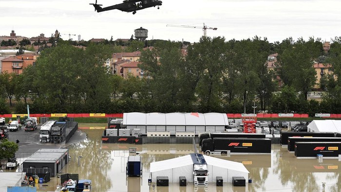 A helicopter flies above the closed Motor racing-Imola paddock, as Santerno river levels rise due to heavy rain, ahead of the weekend's cancelled Emilia Romagna Grand Prix, in Imola, Italy, May 17, 2023. REUTERS/Jennifer Lorenzini