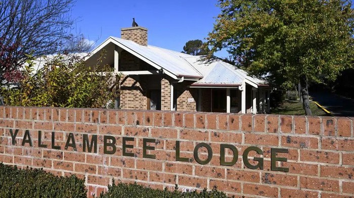 The entrance to the aged care facility Yallambee Lodge in Cooma, Australia is photographed on Friday, May 19, 2023. A 95-year-old woman is in hospital in a critical condition after she was shot with a stun gun in an Australian nursing home as she approached police with a walking frame and a steak knife. (Lukas Coch/AAP Image via AP)