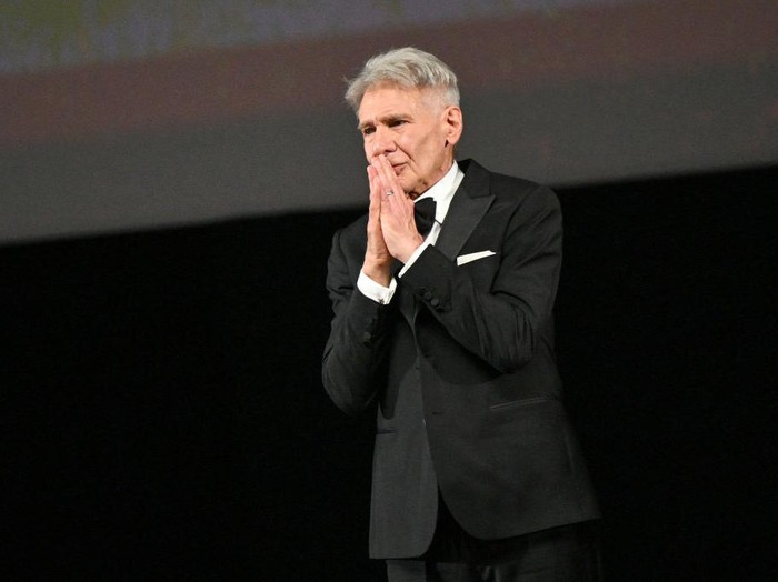 Harrison Ford CANNES, FRANCE - MAY 18: Harrison Ford receives an honorary Palme DOr from Iris Knobloch during the 76th annual Cannes film festival at Palais des Festivals on May 18, 2023 in Cannes, France. (Photo by Stephane Cardinale - Corbis/Corbis via Getty Images)
