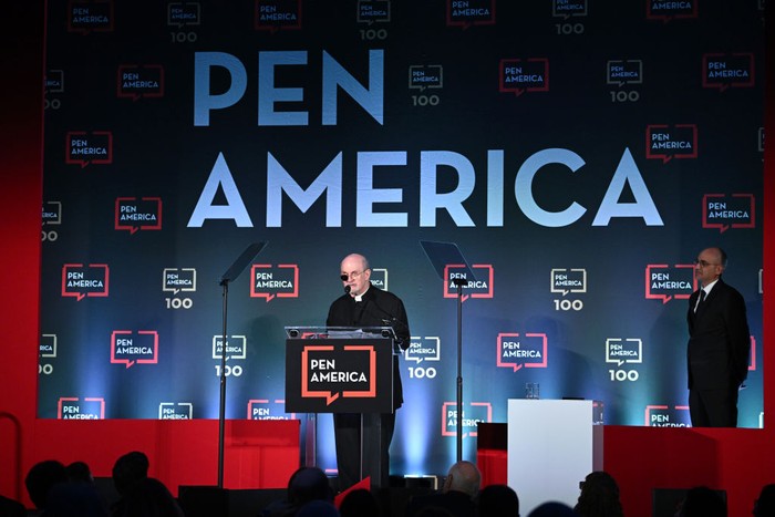 NEW YORK, NEW YORK - MAY 18: Honoree Salman Rushdie and Ayad Akhtar appear on stage at the 2023 PEN America Literary Gala at American Museum of Natural History on May 18, 2023 in New York City. (Photo by Bryan Bedder/Getty Images for PEN America)