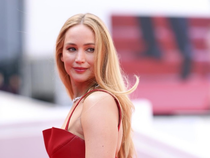Jennifer Lawrence poses for photographers upon arrival at the premiere of the film Anatomy of a Fall at the 76th international film festival, Cannes, southern France, Sunday, May 21, 2023. (Photo by Vianney Le Caer/Invision/AP)