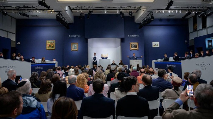 Sotheby's auctioneer Benjamin Doller (C R) takes bids during the Codex Sassoon sale at Sotheby's in New York City on May 17, 2023. According to Sotheby's the Codex Sassoon is the earliest and most complete Hebrew Bible ever discovered and will be offered for auction with an estimate of 30-50 million USD, making it the most valuable printed text or historical document ever offered. (Photo by ANGELA WEISS / AFP) (Photo by ANGELA WEISS/AFP via Getty Images)