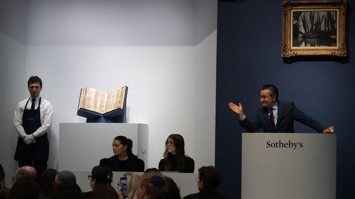 NEW YORK, NEW YORK - MAY 17:  Auctioneer Benjamin Doller, takes bids for The Codex Sassoon during the auction at Sotheby's on May 17 , 2023 in New York City. The codex, which was sold for $38.1 million dollars, is the oldest surviving Hebrew Bible or Tanakh. The Book is approximately 1000 years old and is the most valuable historical document to appear at auction.  (Photo by Alexi Rosenfeld/Getty Images)