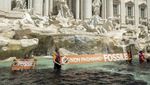 Protes Iklim, Aktivis Lingkungan Ubah Air Mancur Ikon Roma Jadi Hitam