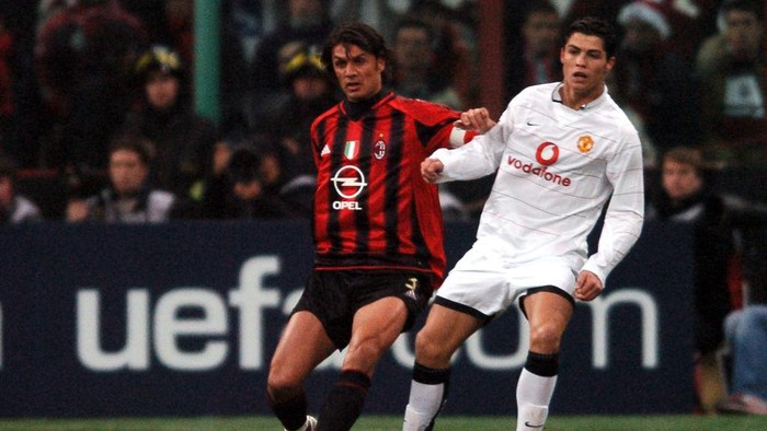 AC Milans Paolo Maldini (l) and Manchester Uniteds Cristiano Ronaldo battle for the ball  (Photo by John Walton - PA Images via Getty Images)
