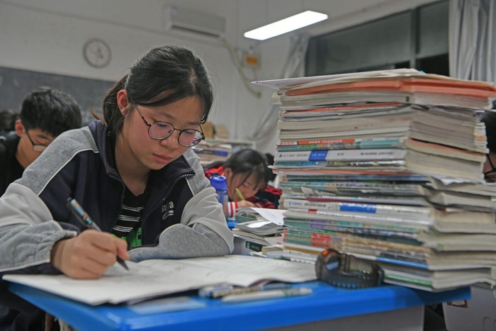 HUAINAN, CHINA - MAY 22: Senior three students study in the classroom at night for the upcoming national college entrance exam on May 22, 2023 in Huainan, Anhui Province of China. (Photo by Chen Bin/VCG via Getty Images)