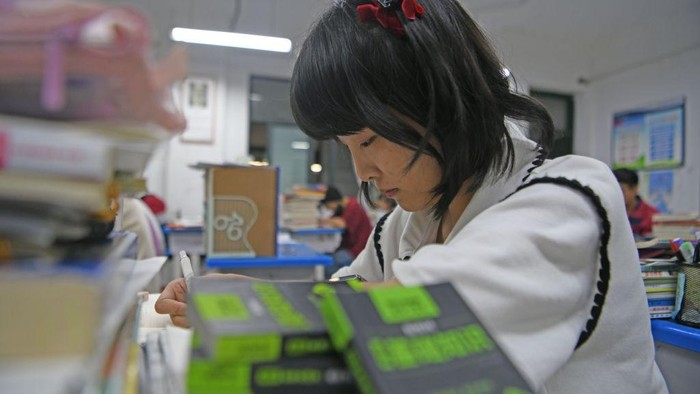 HUAINAN, CHINA - MAY 22: Senior three students study in the classroom at night for the upcoming national college entrance exam on May 22, 2023 in Huainan, Anhui Province of China. (Photo by Chen Bin/VCG via Getty Images)