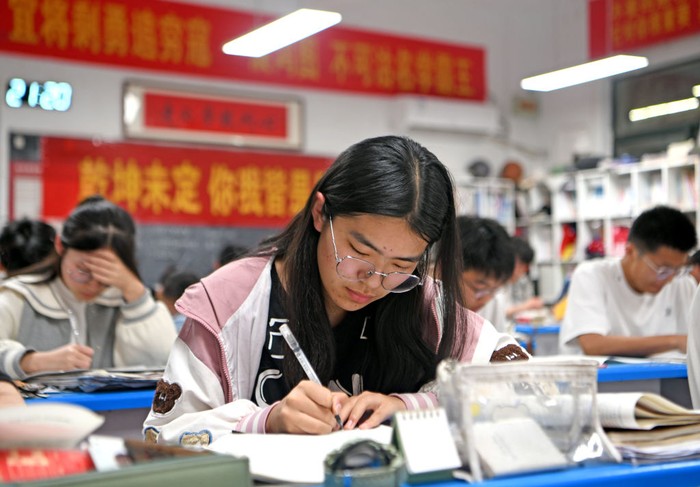 HUAINAN, CHINA - MAY 22: Senior three students study in the classroom at night for the upcoming national college entrance exam on May 22, 2023 in Huainan, Anhui Province of China. (Photo by Chen Bin/VCG via Getty Images)