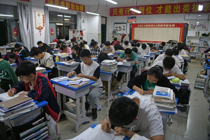 HUAINAN, CHINA - MAY 22: Senior three students study in the classroom at night for the upcoming national college entrance exam on May 22, 2023 in Huainan, Anhui Province of China. (Photo by Chen Bin/VCG via Getty Images)