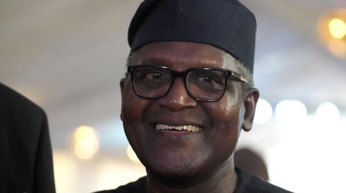 Aliko Dangote, Africa's wealthiest man, attends the opening ceremony of Africa's biggest oil refinery in Lagos, Nigeria, Monday, May 22, 2023. Nigerian President Muhammadu Buhari on Monday opened the oil refinery, with hopes it would help the energy-rich country achieve self-sufficiency and become a net exporter of refined petroleum products. The $19 billion facility built by Dangote, is one of the world's biggest oil refineries and has a capacity of 650,000 barrels per day. (AP Photo/Sunday Alamba)