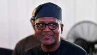Aliko Dangote kini menempati urutan ke-145 orang terkaya di dunia dengan harta sebesar US$ 12, 1 miliar atau setara dengan Rp 185,1 triliun (kurs Rp 15.303). (Pius Utomi Ekpei/AFP via Getty Images)