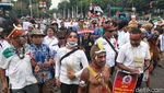 Minta Diangkat ASN, Warga Papua Demo di Patung Kuda
