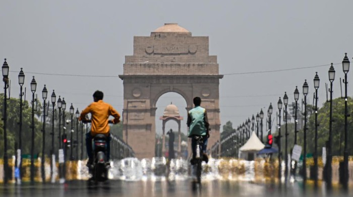 A mirage can be seen on a hot summer day on Kartavya Path, formerly known as Rajpath, in front of India Gate, in New Delhi, India on May 22, 2023. India is witnessing heatwaves in various parts of the country in the recent days. (Photo by Kabir Jhangiani/NurPhoto via Getty Images)