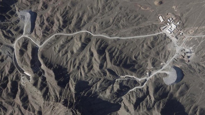 This satellite photo from Planet Labs PBC shows construction on a new underground facility at Irans Natanz nuclear site near Natanz, Iran, on April 14, 2023. A new underground facility at the Natanz enrichment site may put centrifuges beyond the range of a massive so-called bunker buster bomb earlier developed by the U.S. military, according to experts and satellite photos analyzed by The Associated Press. (Planet Labs PBC via AP)