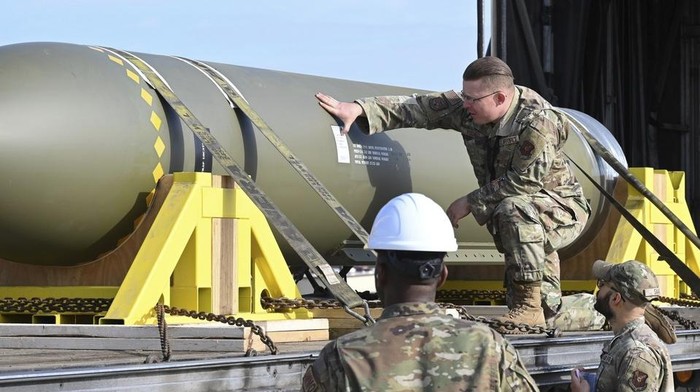 In this photo released by the U.S. Air Force on May 2, 2023, airmen look at a GBU-57, or the Massive Ordnance Penetrator bomb, at Whiteman Air Base in Missouri. That U.S. bomb, designed to destroy underground sites at the height of concerns a decade ago over Irans nuclear program, has briefly reappeared amid new tensions with the Islamic Republic. (U.S. Air Force via AP)