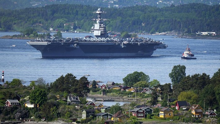The American aircraft carrier USS Gerald R. Ford drives in the Oslo Fjord, Norway, here seen from Ekebergskrenten, Wednesday, May 24, 2023. The ship is the world's largest warship and will be in port in Oslo for four days. (Javad Parsa/NTB Scanpix via AP)