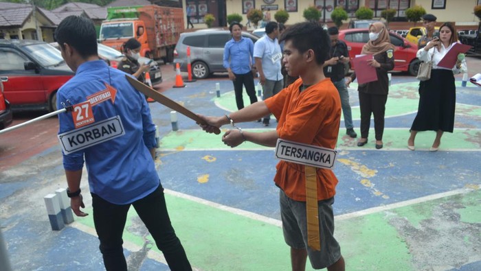 Rekonstruksi pembunuhan di Kutai Barat, Kaltim.