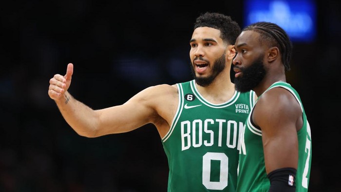 BOSTON, MASSACHUSETTS - MAY 25: Jayson Tatum #0 talks with Jaylen Brown #7 of the Boston Celtics against the Miami Heat during the fourth quarter in game five of the Eastern Conference Finals at TD Garden on May 25, 2023 in Boston, Massachusetts. NOTE TO USER: User expressly acknowledges and agrees that, by downloading and or using this photograph, User is consenting to the terms and conditions of the Getty Images License Agreement. (Photo by Maddie Meyer/Getty Images)