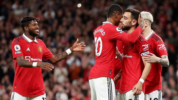 MANCHESTER, ENGLAND - MAY 25: Bruno Fernandes of Manchester United celebrates with Fred and Marcus Rashford after scoring the teams third goal during the Premier League match between Manchester United and Chelsea FC at Old Trafford on May 25, 2023 in Manchester, England. (Photo by Catherine Ivill/Getty Images)