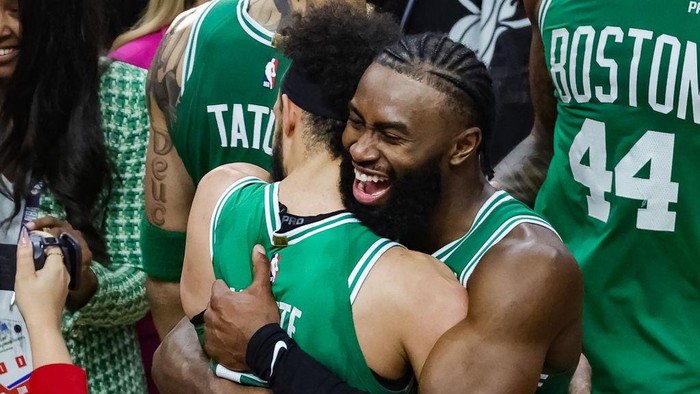 MIAMI, FLORIDA - MAY 27: Derrick White #9 and Jaylen Brown #7 of the Boston Celtics react after defeating the Miami Heat 104-103 in game six of the Eastern Conference Finals at Kaseya Center on May 27, 2023 in Miami, Florida. NOTE TO USER: User expressly acknowledges and agrees that, by downloading and or using this photograph, User is consenting to the terms and conditions of the Getty Images License Agreement. (Photo by Megan Briggs/Getty Images)