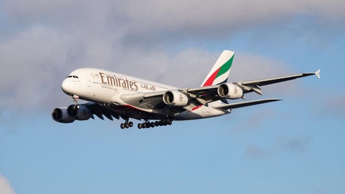 Emirates Airbus A380-800 airplane with registration A6-EEE landing at Amsterdam Schiphol AMS EHAM International Airport in a blue sky with clouds day. Emirates EK or UAE is the large airline in the Middle East and larger Airbus A380 double decker aircraft operator. Emirates connects Amsterdam with DXB OMDB Dubai International Airport daily as it is their hub. The airline is owned by the government of Dubai, United Arab Emirates. (Photo by Nicolas Economou/NurPhoto via Getty Images)