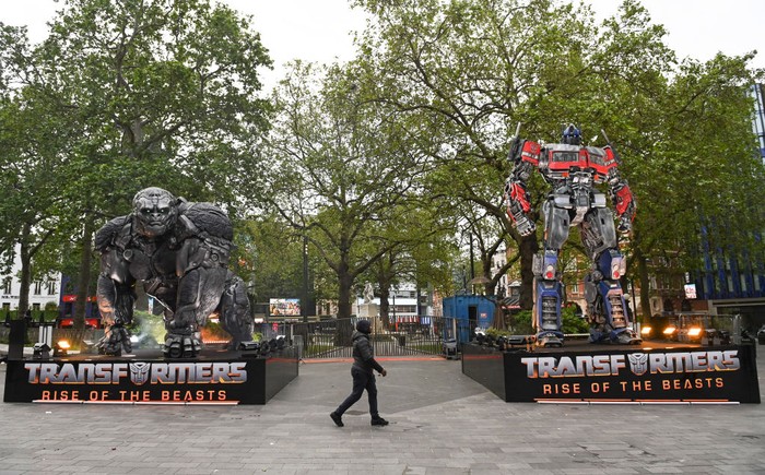 LONDON, ENGLAND - MAY 26: Transformers statues of Autobot leader Optimus Prime and Maximal leader Optimus Primal have been unveiled to mark the release of 