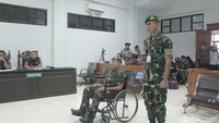 Sidang putusan ini digelar di Pengadilan Militer Medan. Sertu Yalpin menghadiri sidang menggunakan kursi roda.