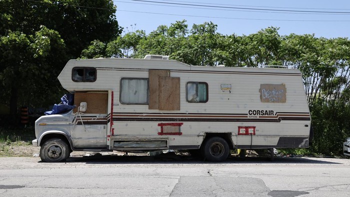 TORONTO, ON - May 29 With the current housing crunch and economic problems, some people have taken to living in their car or in campers. A series of trailers and campers have been parked for months on Bouchette near the Logan and Lakeshore intersection.
May 29 2023 (Richard Lautens/Toronto Star via Getty Images)