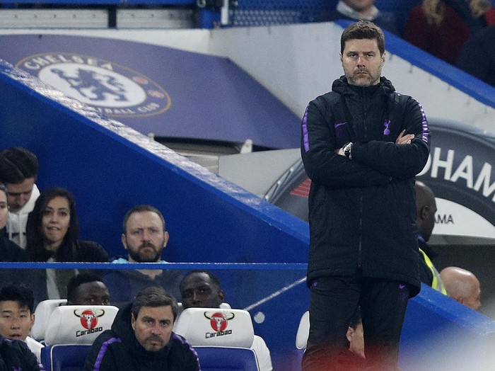 Tottenham Hotspurs Argentinian head coach Mauricio Pochettino reacts during the English Premier League football match between Chelsea and Tottenham Hotspur at Stamford Bridge in London on February 27, 2019. - Chelsea won the match 2-0. (Photo by Adrian DENNIS / AFP) / RESTRICTED TO EDITORIAL USE. No use with unauthorized audio, video, data, fixture lists, club/league logos or live services. Online in-match use limited to 120 images. An additional 40 images may be used in extra time. No video emulation. Social media in-match use limited to 120 images. An additional 40 images may be used in extra time. No use in betting publications, games or single club/league/player publications. /         (Photo credit should read ADRIAN DENNIS/AFP via Getty Images)