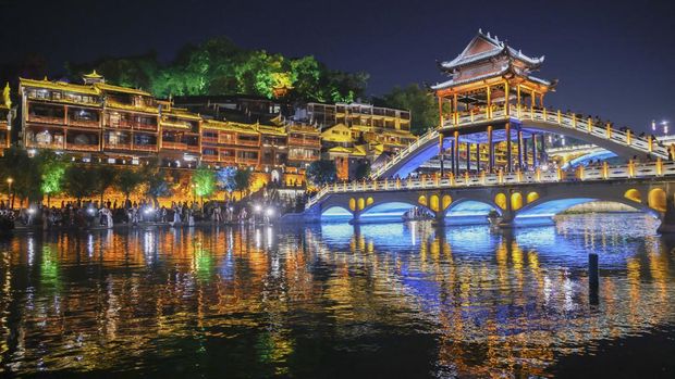XIANGXI, CHINA - MAY 29: Aerial view of Fenghuang Ancient Town on May 29, 2023 in Xiangxi Tujia and Miao Autonomous Prefecture, Hunan Province of China. (Photo by (Han Jiajun/VCG via Getty Images)