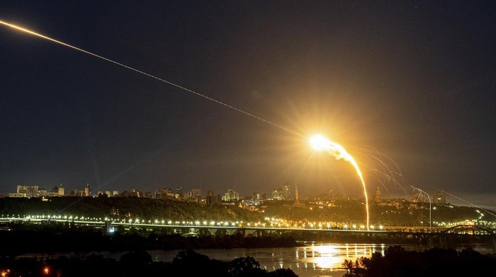 Ukrainian air defense intercepts a Shahed drone mid-air in the third Russia aerial attack on the capital in the last 24 hours in Kyiv, Ukraine, Tuesday, May 30, 2023. (AP Photo/Evgeniy Maloletka)