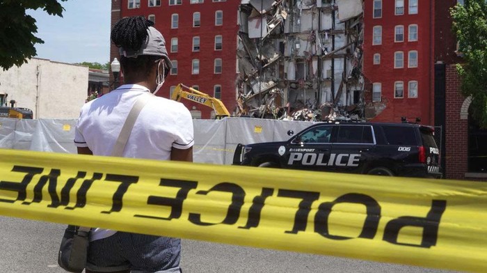 DAVENPORT, IOWA - MAY 29: Clothes still hang in a closet after a portion of a six-story apartment building collapsed on May 29, 2023 in Davenport, Iowa. Eight people were rescued from the debris following the collapse which occurred yesterday afternoon.  (Photo by Scott Olson/Getty Images)