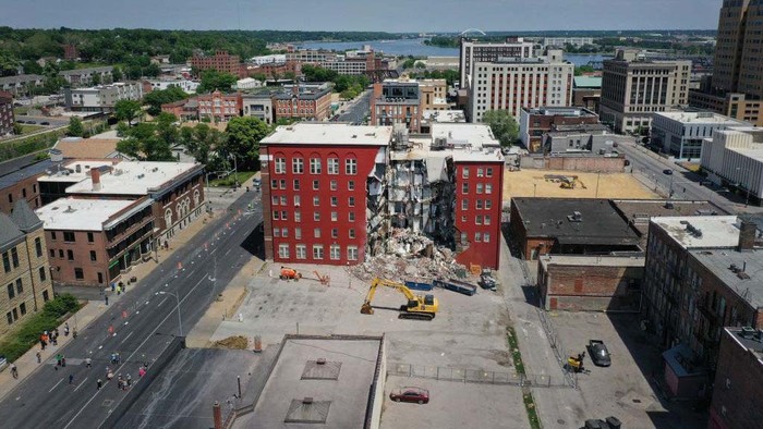 DAVENPORT, IOWA - MAY 29: Clothes still hang in a closet after a portion of a six-story apartment building collapsed on May 29, 2023 in Davenport, Iowa. Eight people were rescued from the debris following the collapse which occurred yesterday afternoon.  (Photo by Scott Olson/Getty Images)