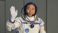 Jing Haipeng, mission commander for the Shenzhou-16 mission waves during a send-off ceremony for his manned space mission at the Jiuquan Satellite Launch Center in northwestern China, Tuesday, May 30, 2023. (AP Photo/Mark Schiefelbein)