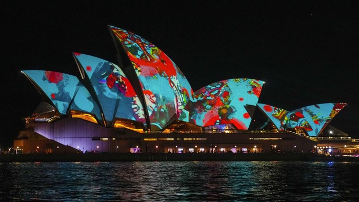The Sydney Opera House sails are illuminated as part of the Vivid festival in Sydney, Australia, Monday, May 29, 2023. Vivid Sydney is a show of light sculptures, multimedia interactive works and building projections that transform various buildings and landmarks such as the Sydney Opera House and Sydney Harbour Bridge in and around the Sydney central business district into an outdoor night time canvas of art. (AP Photo/Mark Baker)