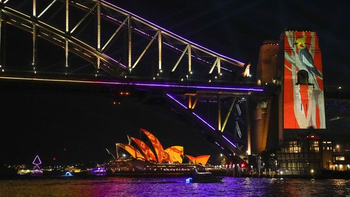 The Sydney Opera House sails are illuminated as part of the Vivid festival in Sydney, Australia, Monday, May 29, 2023. Vivid Sydney is a show of light sculptures, multimedia interactive works and building projections that transform various buildings and landmarks such as the Sydney Opera House and Sydney Harbour Bridge in and around the Sydney central business district into an outdoor night time canvas of art. (AP Photo/Mark Baker)