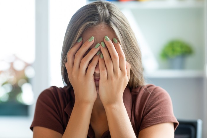 Woman receiving bad news