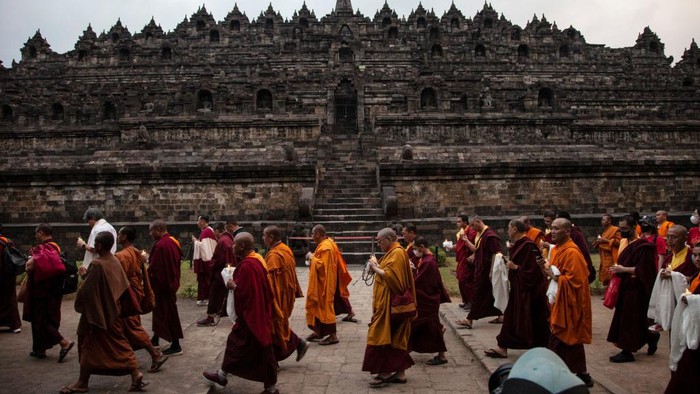 Buddhist monks from Tibet, perform Pradaksina at Borobudur temple in Magelang, Central Java, on June 1, 2023. Buddhist monks from various countries, have arrived at Borobudur Temple to celebrate Vesak day on June 4. (Photo by Aditya Irawan/NurPhoto via Getty Images)